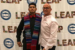 Peter with a graduate. 