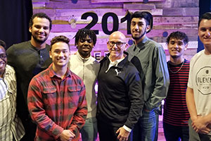 Peter with two students. 